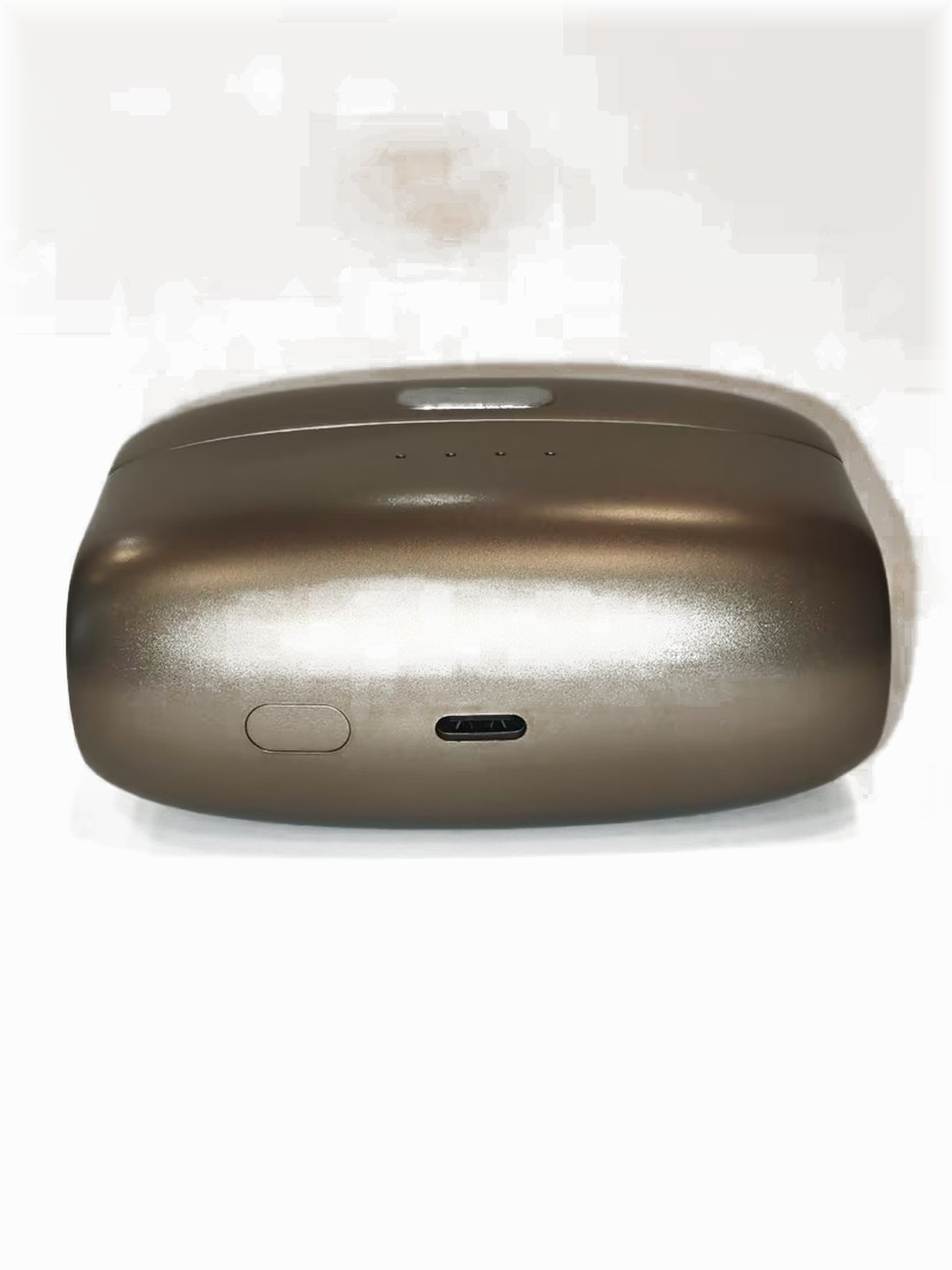 The underside of the charging case, showing the reset button and the USB-C port.